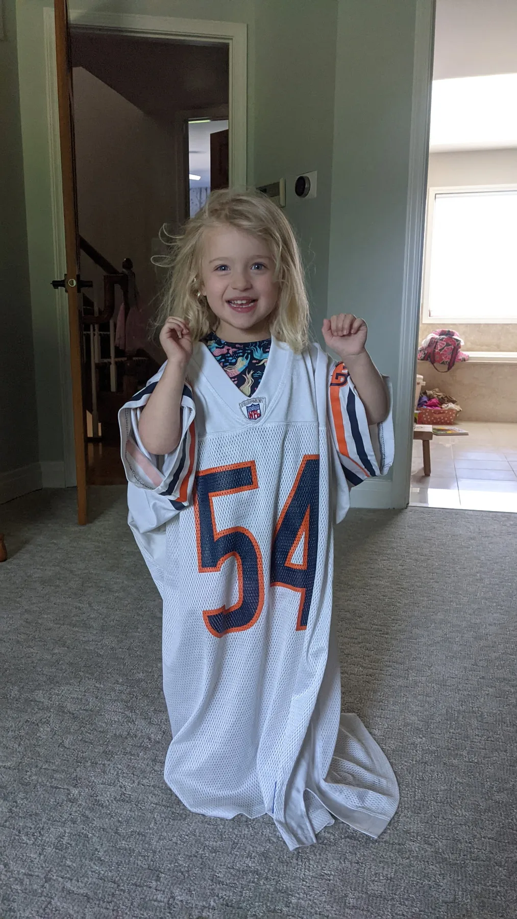 Abigail wearing an oversized Chicago Bears jersey